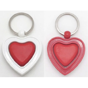 llavero corazon giratorio antiestres color blanco y rojo
