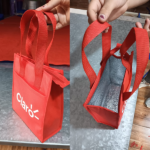 lonchera cooler de notex con bolsillo y cierre en allpublicidad