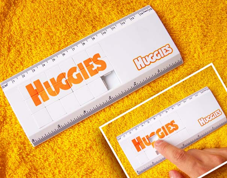 Mini rompecabeza o puzzle con regla en allpublicidad
